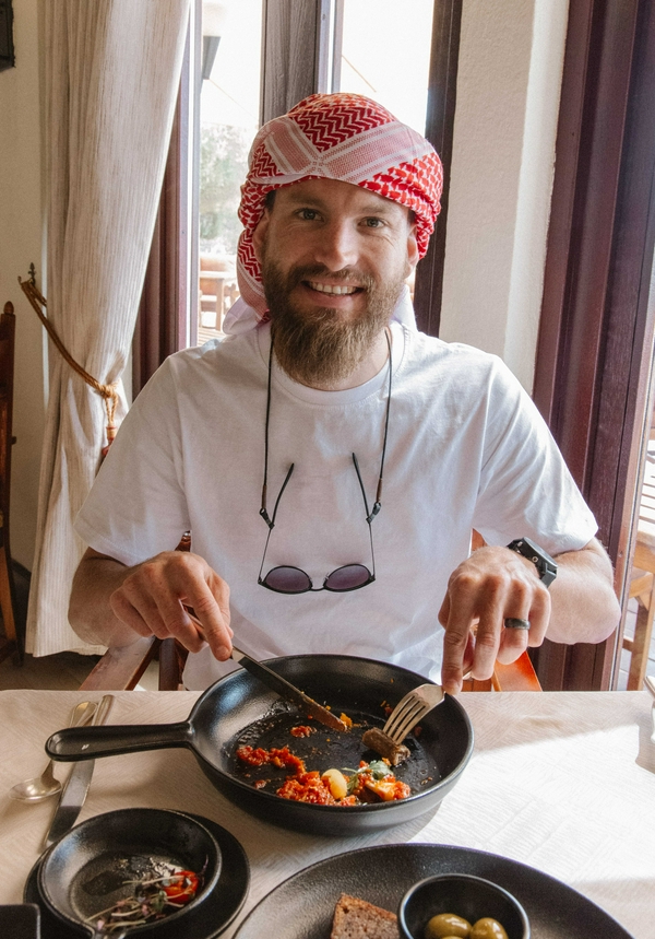 Group exploring desert dunes on a strenuous outdoor adventure