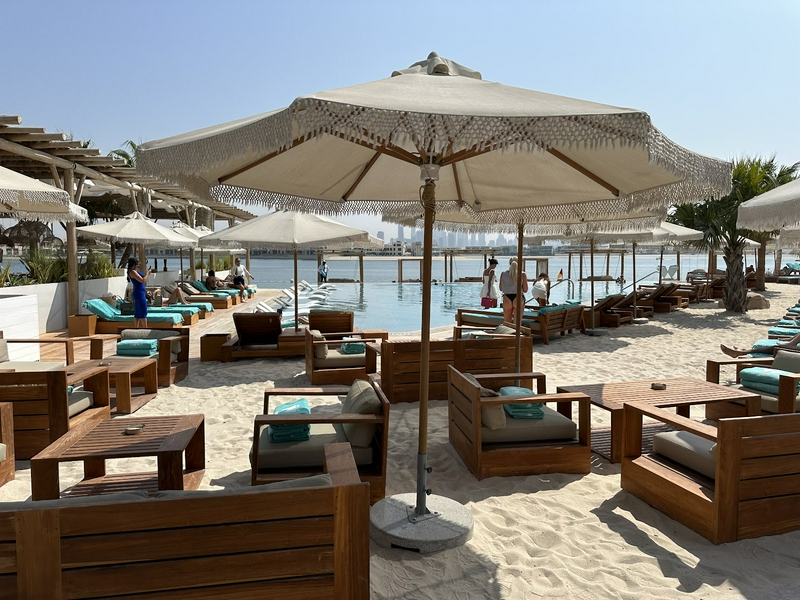 Beautiful view of White Beach Dubai with soft white sand and clear water.