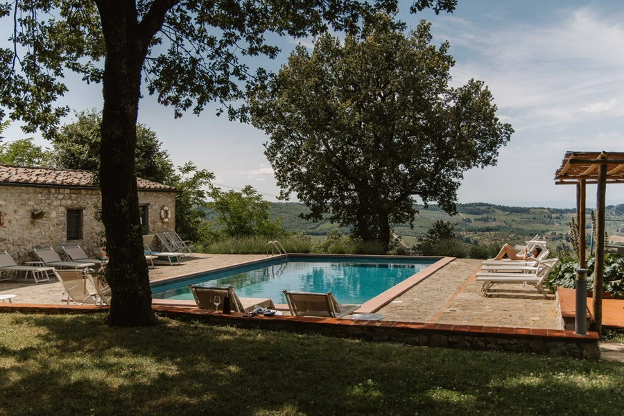 Intimate vineyard dinner experience in Tuscany with cooking class.