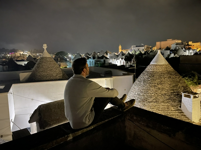 Trulli houses in Alberobello, Puglia, showcasing unique architectural style.