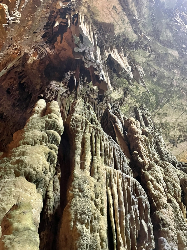 Inside the Castellana Caves showcasing large stalactites and unique karst formations.