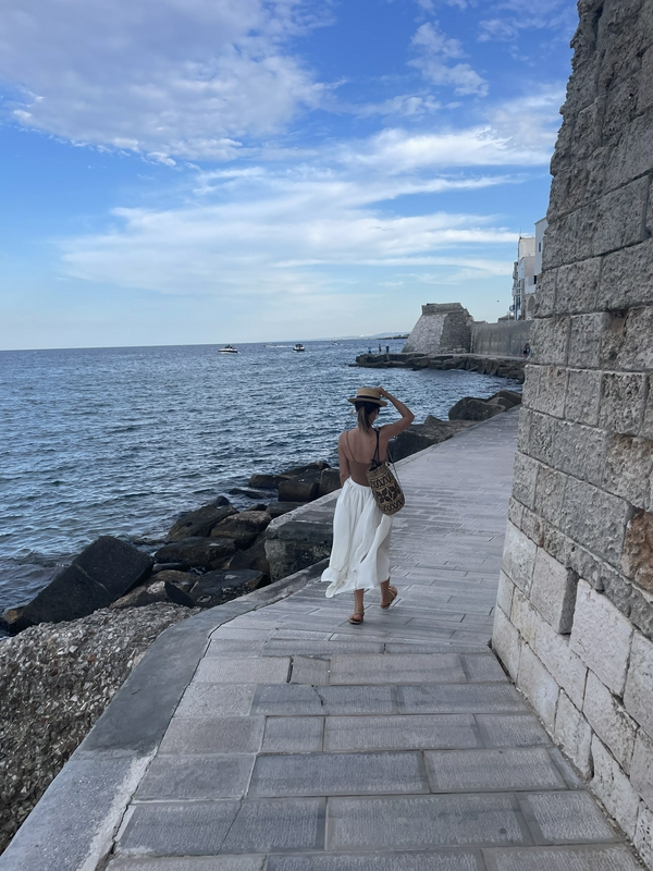 Visitors exploring the stunning architecture of Castello Carlo V