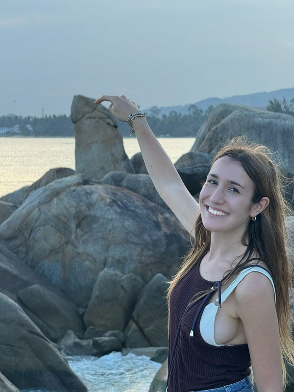 Visitors enjoying the moderate outdoor experience at Lamai Beach's Hin Ta Hin Yai rock formations.