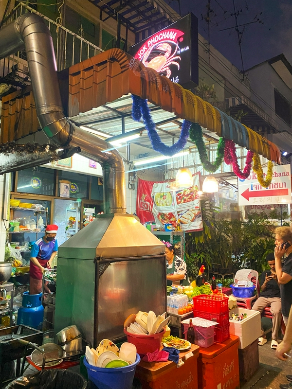 Bangkok's vibrant street life and intricate Thai architecture.