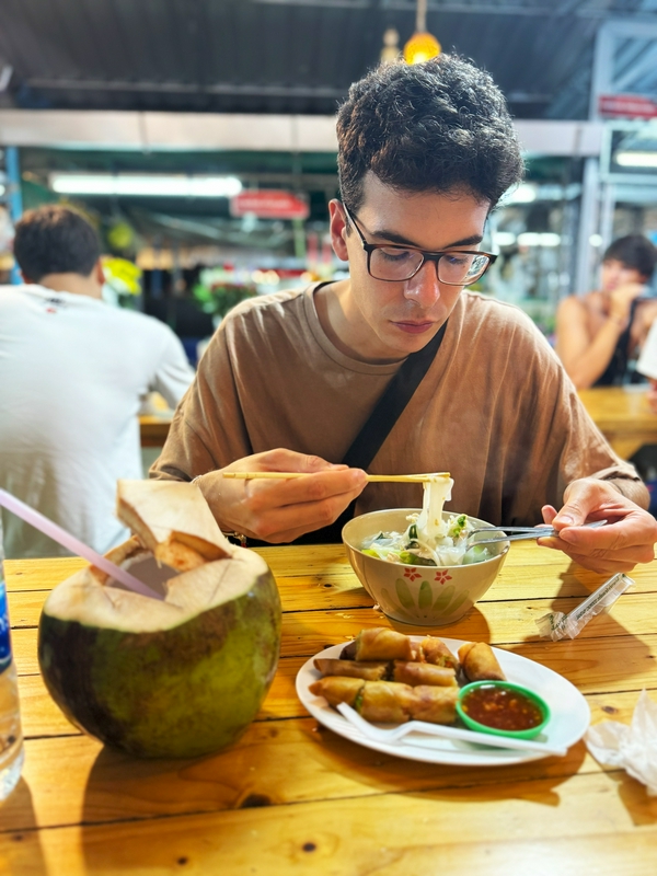 New Year's celebration in Krabi featuring fireworks and lanterns at Ao Nang Beach.