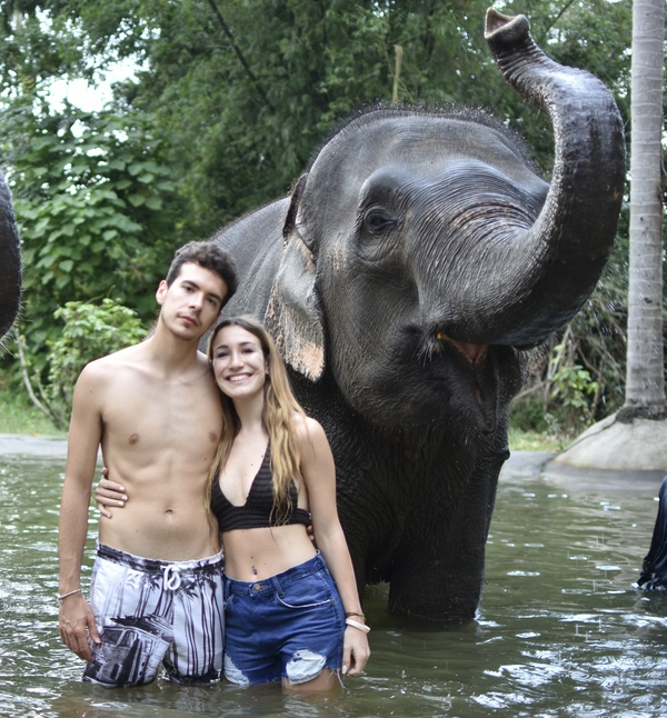 Koh Samui's beautiful beaches and an elephant sanctuary, with scooter rental for exploring the island.