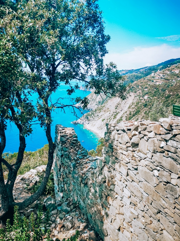 Hiking through crystal clear waters and stunning staircases in Campiglia.