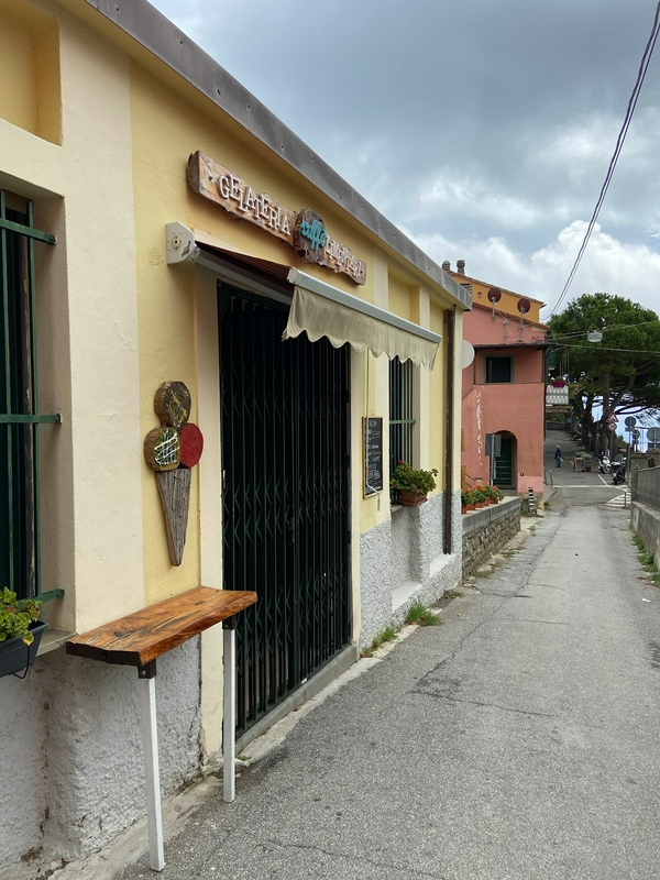 Delicious gelato and pizza at Gelateria 4B, capturing the essence of Italian culinary delights.