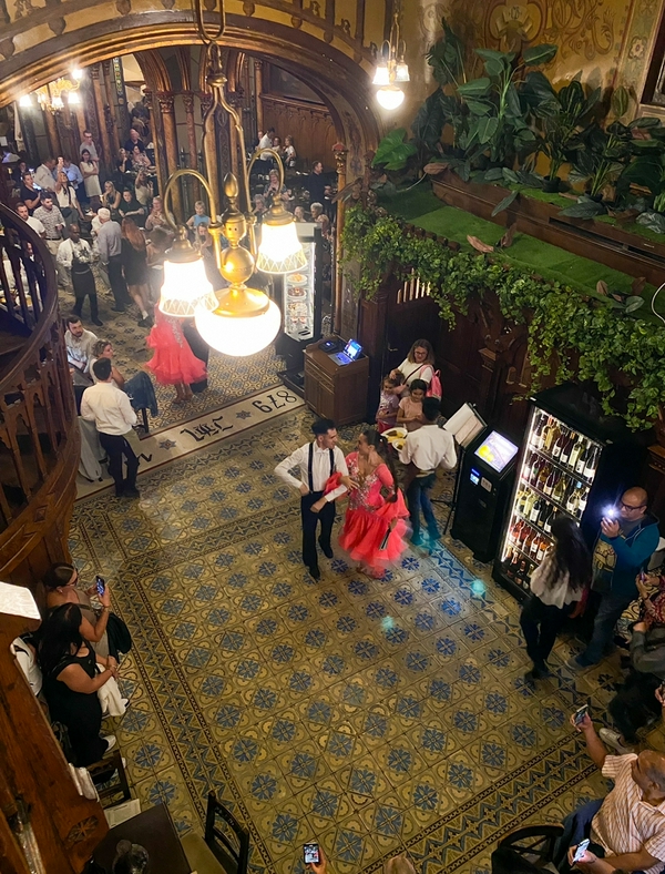 Rustic dining experience at Caru' cu bere in Bucharest.