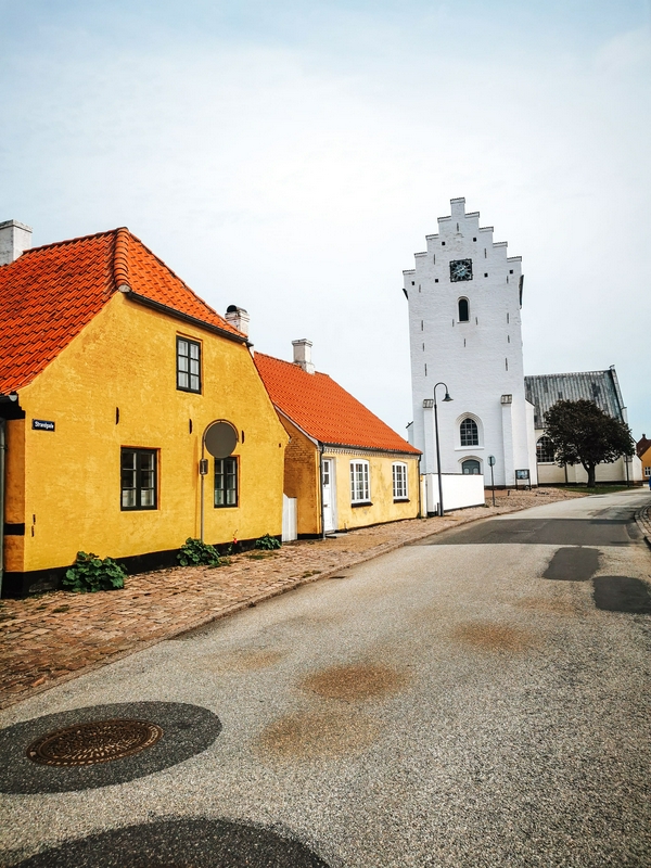 Colorful houses in Sæby, a traditional fishing village in Northern Europe.