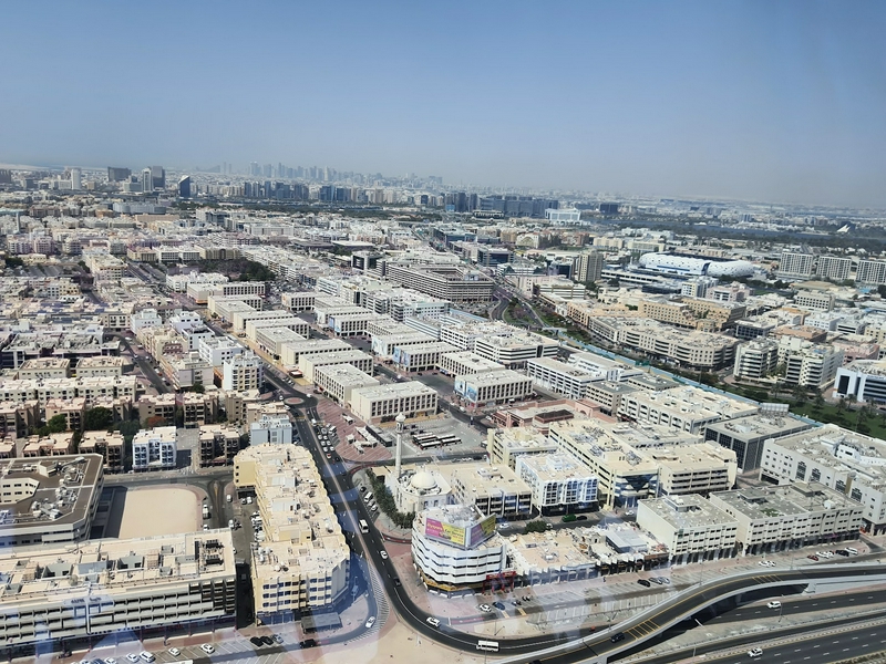 Aerial view of Dubai showcasing the Dubai Frame and skyline.