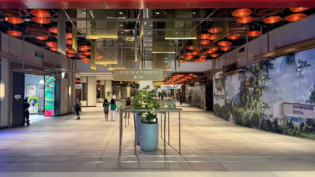 Vibrant scenes of Chinatown Dubai Mall showcasing modern architecture and cultural experiences.
