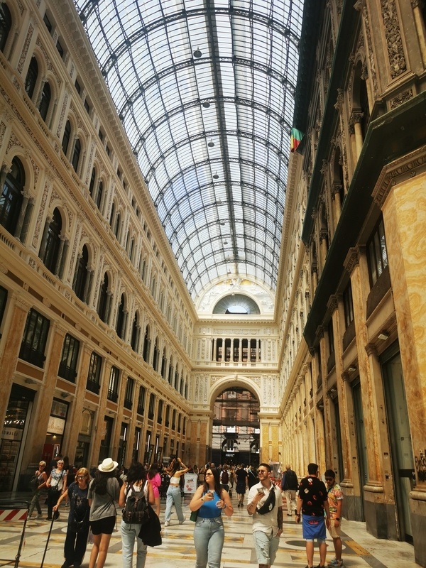 Galleria Umberto I, a historic shopping gallery in Naples, Italy, featuring neoclassical architecture.
