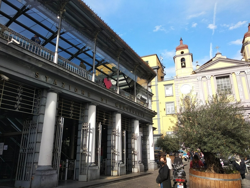 Vintage photo machine at Stazione Montesanto for capturing moments.
