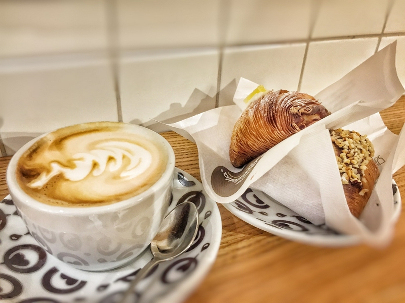 Various types of sfogliatella, showcasing traditional Italian pastries with rich fillings.