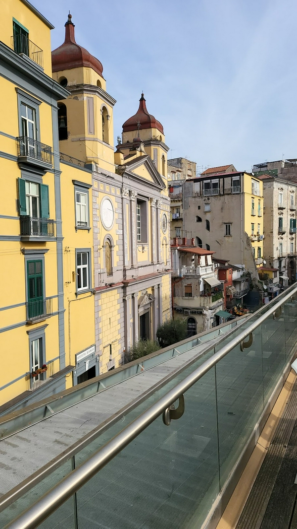 Photo booth with vintage prints and celebratory graphics at Stazione Montesanto EAV.