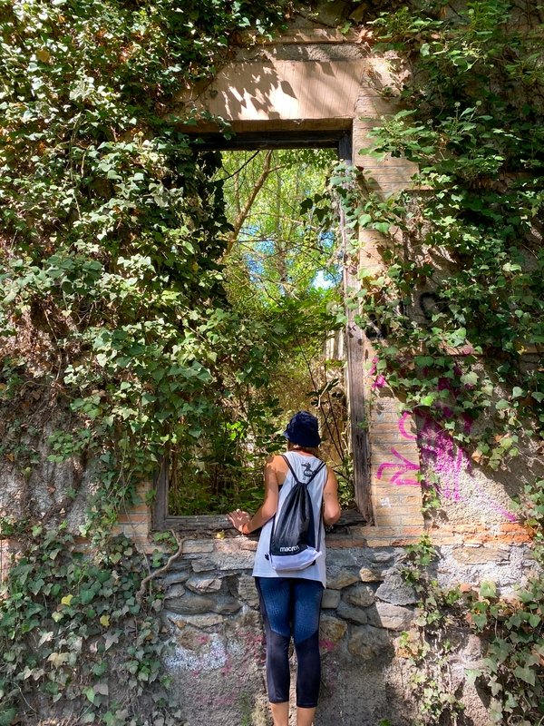 Trekking in Sierra Nevada with scenic views along a river.