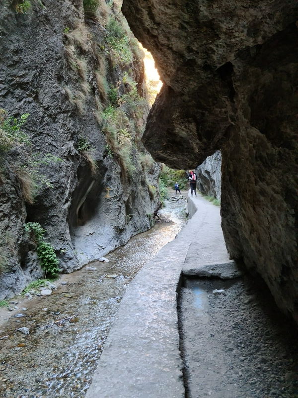 Trekking in Sierra Nevada showcasing beautiful river trails and panoramic views.