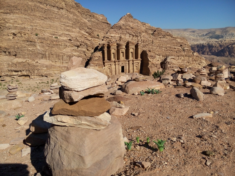 Prominent rock formation in the desert landscape of Petra, Jordan.