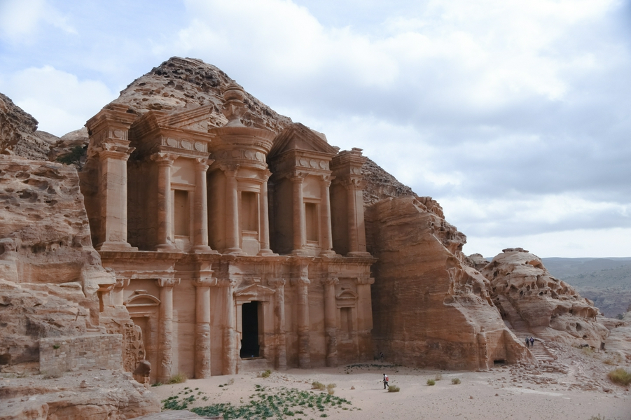 Ancient architecture and rock formations of Petra in the desert landscape