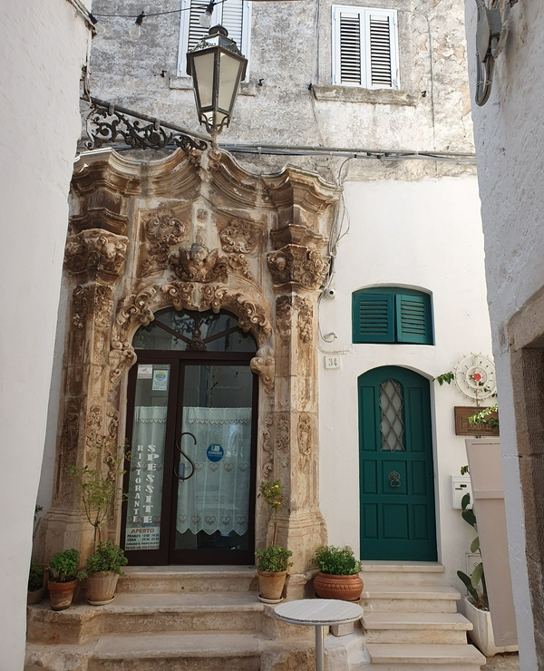 Intricate door and architectural details of Ostuni's charming streets.