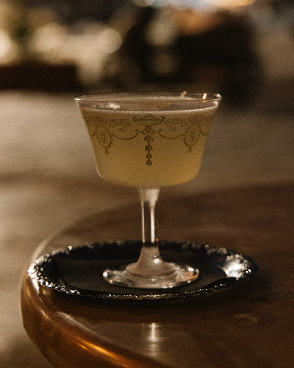 Stylish cocktails served in elegant glasses at Eva's Cocktail Bar.