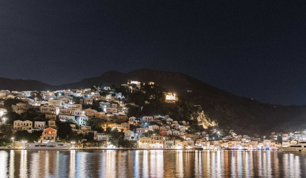 Relaxing outdoor setting at Eva's Cocktail Bar with sea views.
