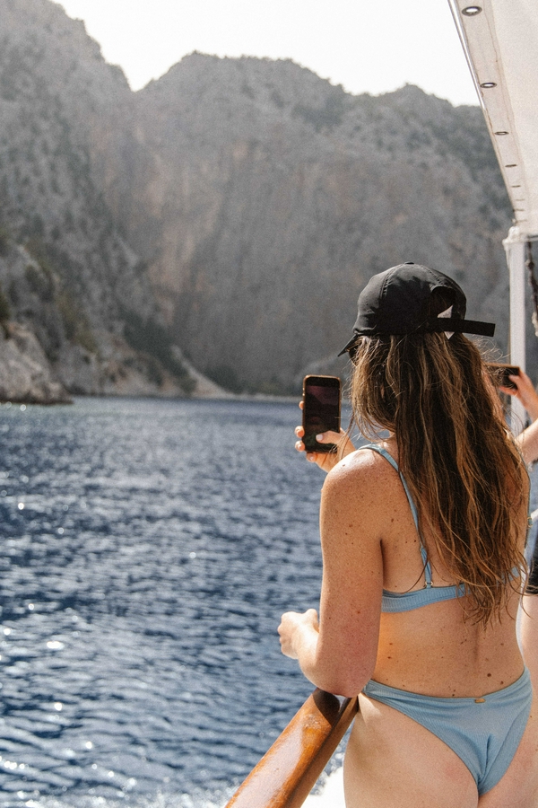 Participants enjoying the Poseidon boat tour with swimming and snorkeling.