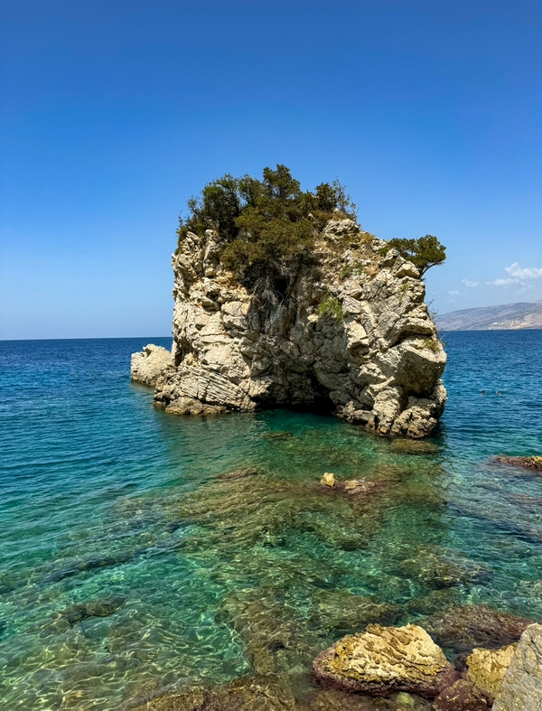 Beautiful sunset view at Ksamil Beach with scenic waters and amenities.