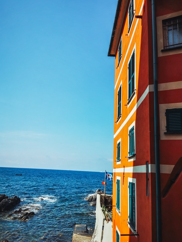 Charming cobblestone street leading to Boccadasse Beach